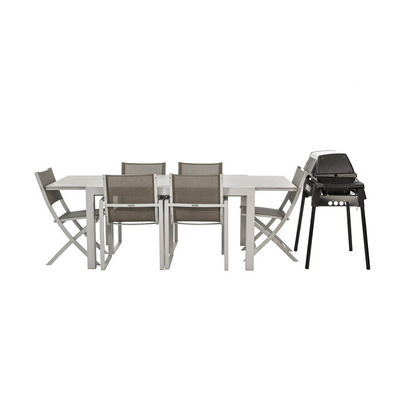Outdoor furniture being covered step-by-step with a BAG’IN protective cover system.