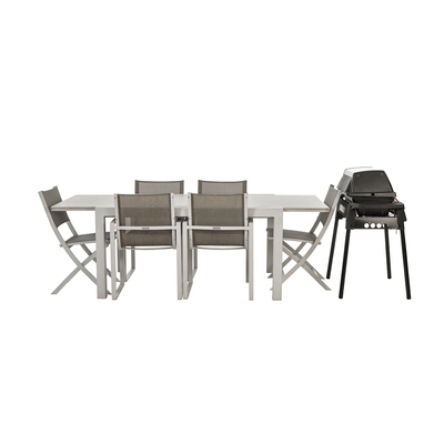 Outdoor furniture arranged and covered with a BAG’IN protective cover for winter storage.