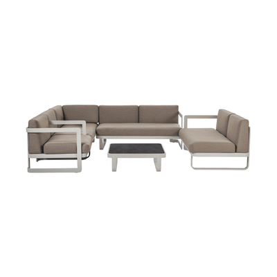 Furniture placed on a base and enclosed with a BAG’IN cover for durable outdoor storage.