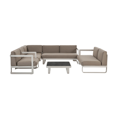 Outdoor lounge furniture being covered with a BAG’IN cover for long-term weather protection.