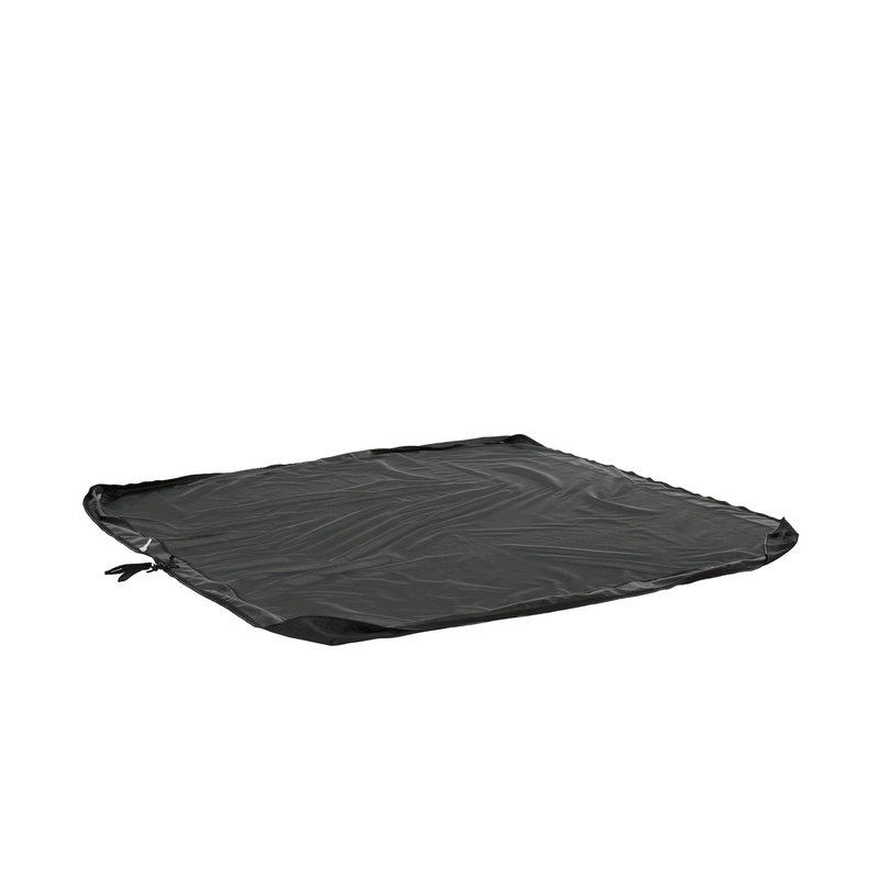 Outdoor furniture being stacked and covered with a BAG’IN protective cover for compact, weatherproof storage.