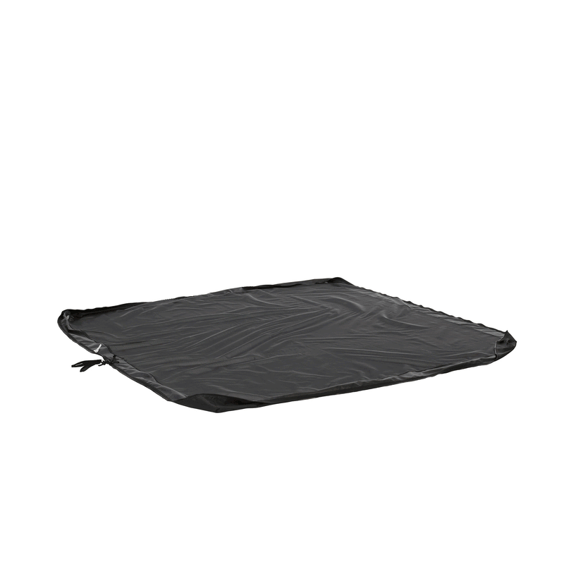 Outdoor lounge set being stacked and protected with a BAG’IN cover for efficient outdoor storage.